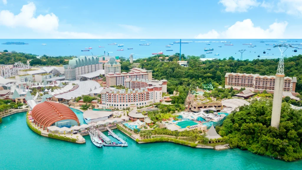 Aerial view of Resorts World Sentosa on Sentosa Island | showcasing the luxurious hotel and surrounding attractions | Triumph Holidays